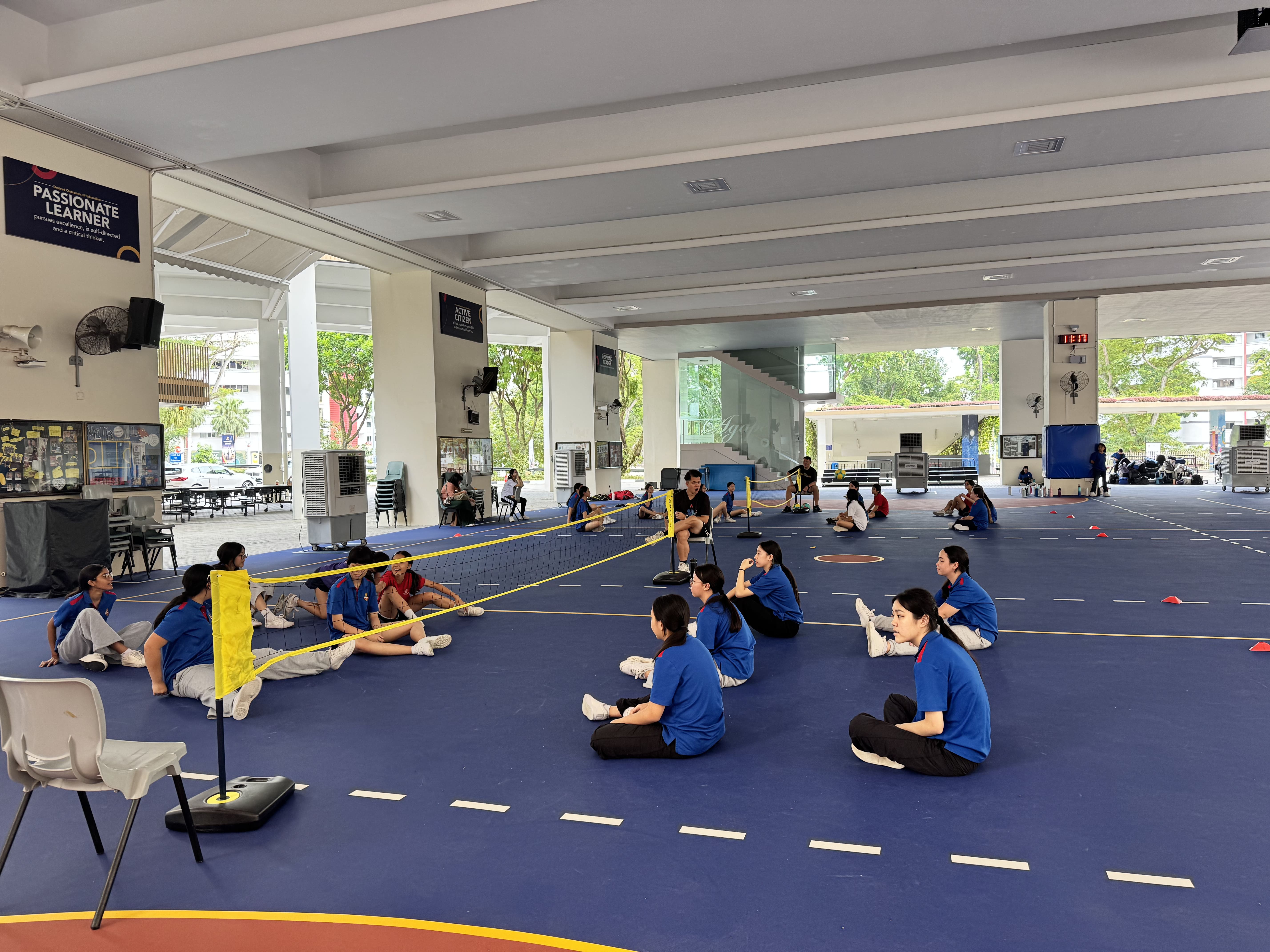 Learning about resilience and inclusivity through sitting volleyball during Company Camp